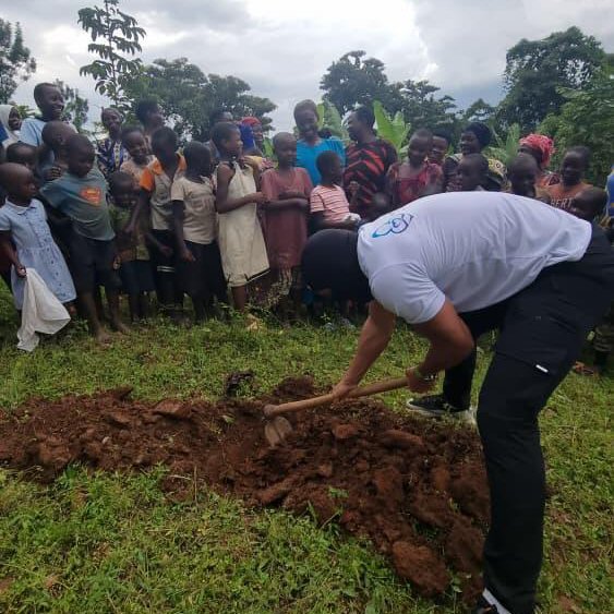 A member of The Anonymous Project began the process of digging the wells.